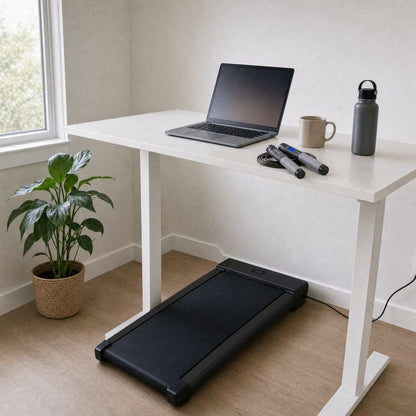 Desk + Break Kit: black under-desk walking pad at a standing desk with the counting jump rope